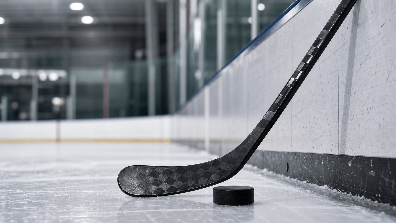 Custom ice hockey stick on rink ice lifestyle photo